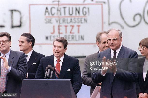 President Ronald Reagan, commemorating the 750th anniversary of Berlin, addresses on June 12, 1987 the people of West Berlin at the base of the...