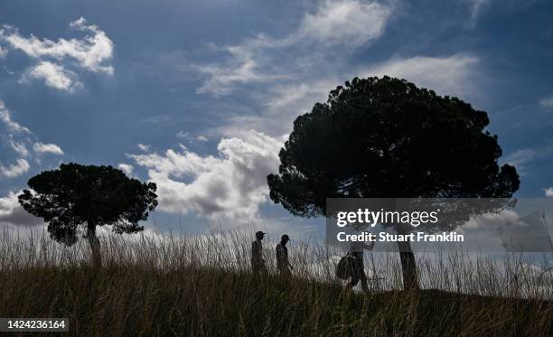 Tom Lewis of England and Paul Dunne of Ireland on the 18th hole on Day Two of the DS Automobiles Italian Open 2022 at Marco Simone Golf Club on...