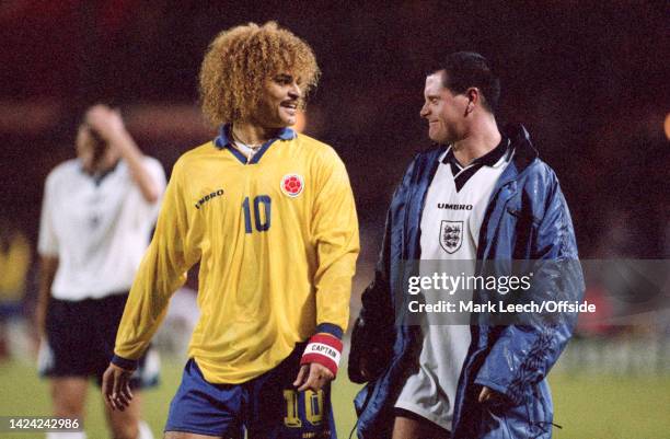 September 1995, Wembley - International Friendly - England v Colombia - Carlos Valderrama of Colombia talks to Paul Gascoigne of England.