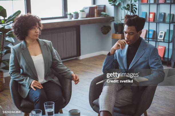 meeting with book publisher - scriptwriter stockfoto's en -beelden