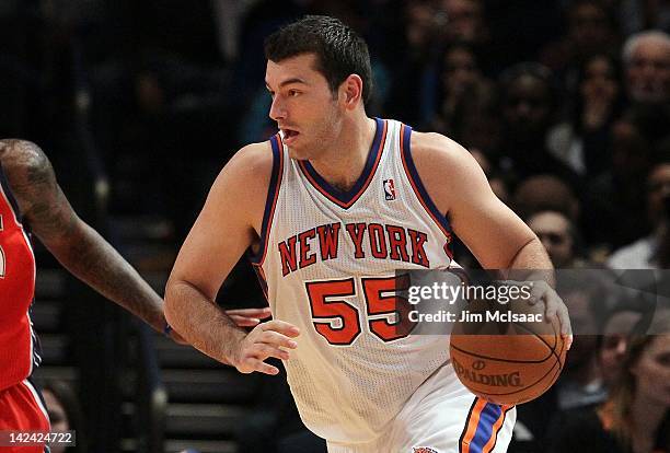 Josh Harrellson of the New York Knicks in action against the New Jersey Nets during their pre season game on December 21, 2011 at Madison Square...