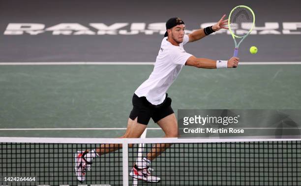 Jan-Lennard Struff of Germany plays a backhand against Zizou Bergs of Belgium during the Davis Cup Group Stage 2022 Hamburg match between Germany and...
