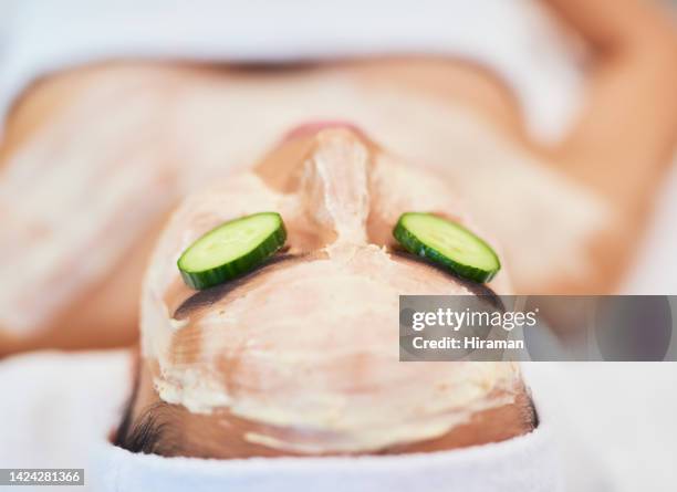 facial, spa and cucumber eye wellness treatment at luxury resort. stress relief or pamper session with beautician for attractive body. skincare and healthy skin mask for beauty therapy lifestyle. - cucumber eye mask stock pictures, royalty-free photos & images