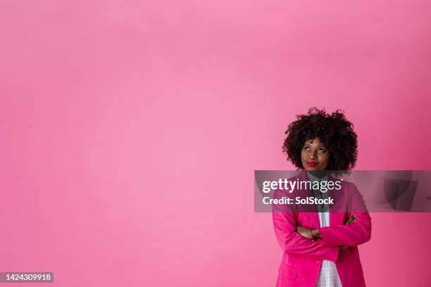 confidence in the workplace studio shot - pink background stock pictures, royalty-free photos & images