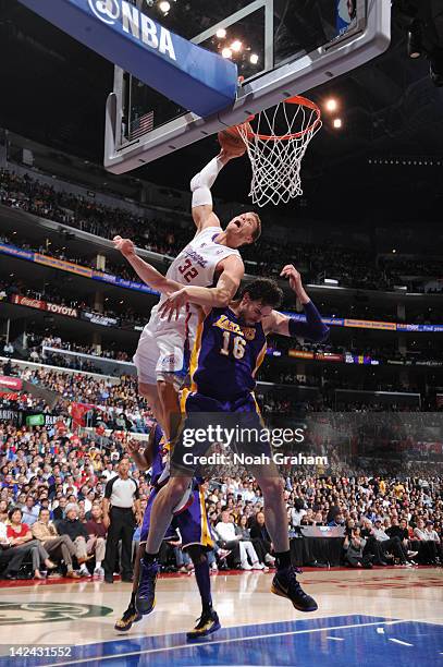 Blake Griffin of the Los Angeles Clippers throws down a dunk against Pau Gasol of the Los Angeles Lakers at Staples Center on April 4, 2012 in Los...