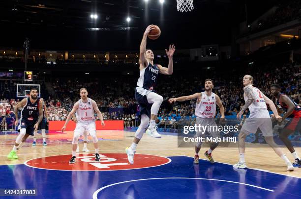 Terry Tarpey of France dunks the ball during the FIBA EuroBasket 2022 semi-final match between Poland and France at EuroBasket Arena Berlin on...