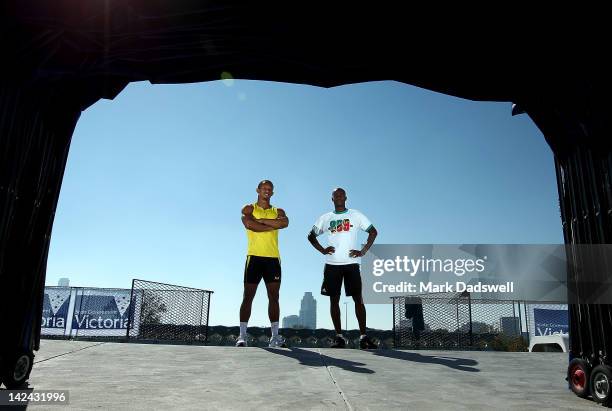 Michael Frater of Jamaica and Kim Collins of Saint Kitts and Nevis pose for a photo during a training session ahead of The 131st Stawell Gift, at...