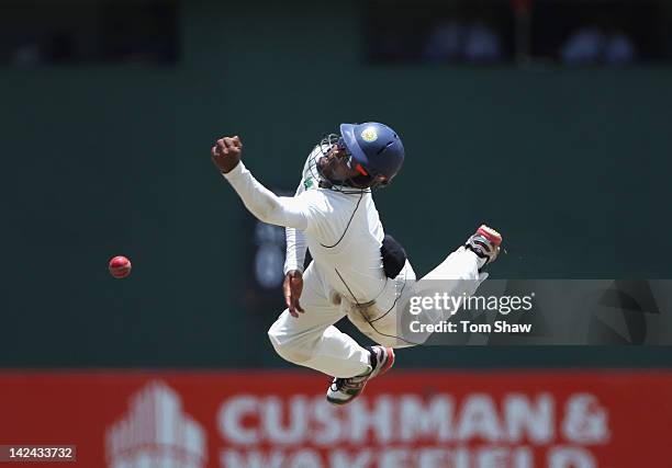 Lahiru Thirimanne of Sri LAnka dives in vain off a chance from Kevin Pietersen of England during day 3 of the 2nd test match between Sri Lanka and...