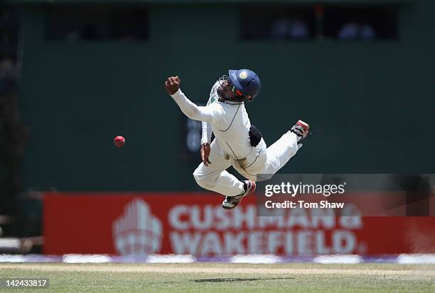 Lahiru Thirimanne of Sri Lanka dives in vain off a chance from Kevin Pietersen of England during day 3 of the 2nd test match between Sri Lanka and...