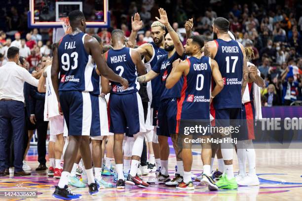 Players of France celebrate after the FIBA EuroBasket 2022 semi-final match between Poland and France at EuroBasket Arena Berlin on September 16,...