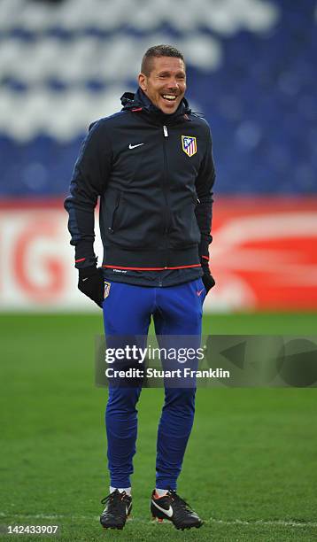 Diego Simeone, head coach of Athletico Madrid ponders during the training session ahead of their UEFA Europa League quarter-final second leg against...