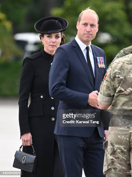 Prince William, Prince of Wales and Catherine, Princess of Wales meet with military personnel during a visit to Army Training Centre Pirbright on...