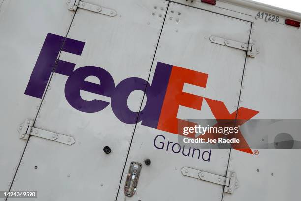 Sign on the side of a FedEx truck on September 16, 2022 in Miami Beach, Florida. Shares of FedEx fell after the company missed estimates on revenue...