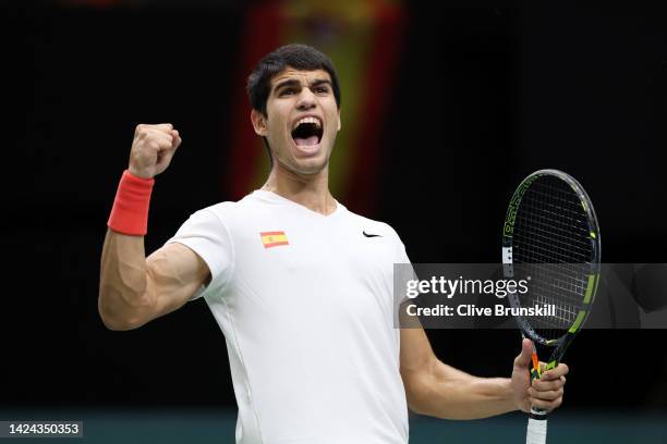 Carlos Alcaraz of Team Spain celebrates winning set point against Felix Auger Aliassime of Team Canada during the Davis Cup Group Stage 2022 Valencia...