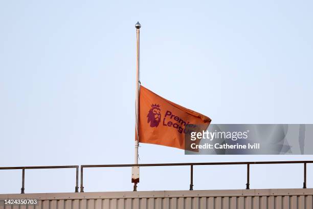 The Premier League flag is seen at half mast in memory of Her Majesty Queen Elizabeth II, who died away at Balmoral Castle on September 8 prior to...