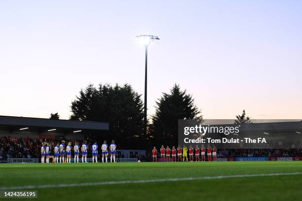 Players and spectators observe a minute silence to pay tribute to Her Majesty Queen Elizabeth II, who died away at Balmoral Castle on September 8...