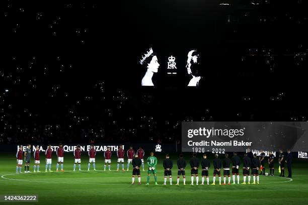 Players and spectators observe a minute silence, as they pay tribute to Her Majesty Queen Elizabeth II, who died away at Balmoral Castle on September...