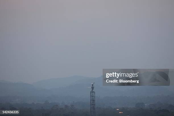 Fire burns from a chimney at the flare area in the Numaligarh Refinery Ltd. Complex in Golaghat, India, on Wednesday, March 28, 2012. India's state...