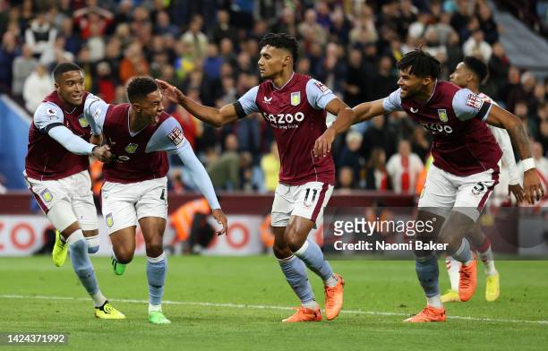 Jacob Ramsey of Aston Villa celebrates after scoring their side's first goal with Ollie Watkins and team mates during the Premier League match...
