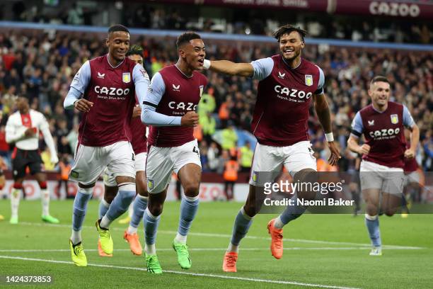 Jacob Ramsey of Aston Villa celebrates after scoring their side's first goal with Tyrone Mings and team mates during the Premier League match between...