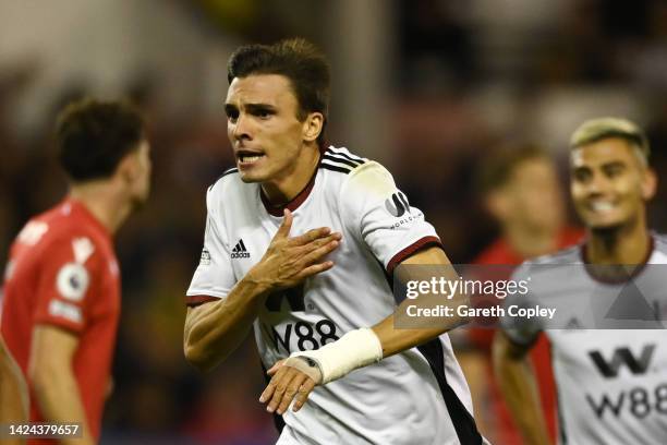 Joao Palhinha of Fulham celebrates after scoring their team's second goal during the Premier League match between Nottingham Forest and Fulham FC at...