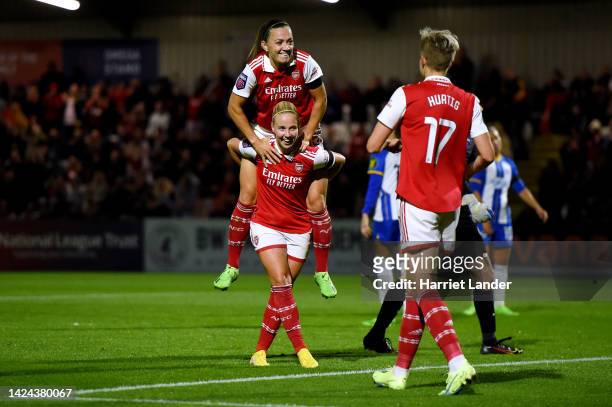 Beth Mead of Arsenal celebrates with team mate Katie McCabe after scoring their sides fourth goal during the FA Women's Super League match between...