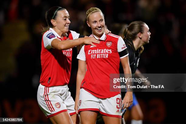 Beth Mead of Arsenal celebrates with team mate Katie McCabe after scoring their sides fourth goal during the FA Women's Super League match between...