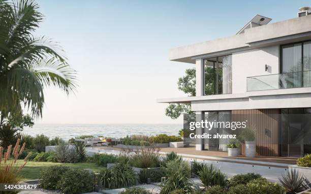 3d renders of luxurious house along the sea - building front view stock pictures, royalty-free photos & images