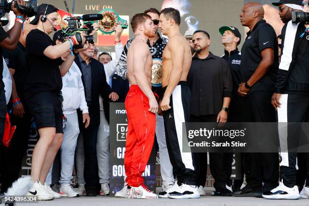 Canelo Alvarez of Mexico and Gennadiy Golovkin of Kazakhstan pose during their ceremonial weigh-in at Toshiba Plaza on September 16, 2022 in Las...