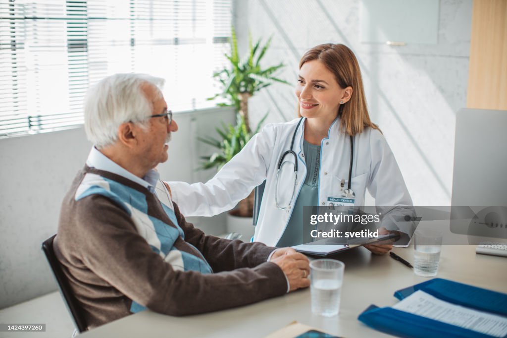 Senior men visiting doctor