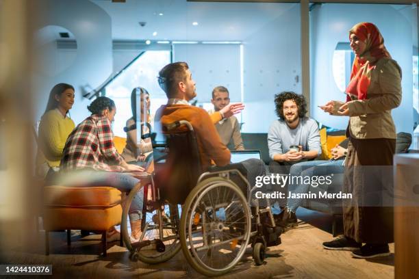 diverse and creative multiethnic business group - disability work photos et images de collection