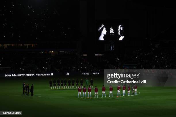 Players and spectators observe a minute silence, as they pay tribute to Her Majesty Queen Elizabeth II, who died away at Balmoral Castle on September...