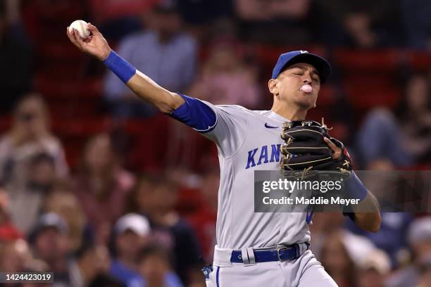 Nicky Lopez of the Kansas City Royals throws to first to force out Enrique Hernandez of the Boston Red Sox during the third inning at Fenway Park on...