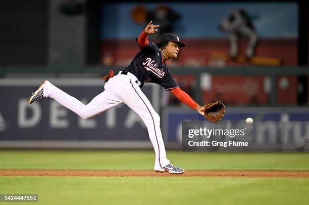 Abrams of the Washington Nationals flips the ball to first base to force out Lewin Diaz of the Miami Marlins in the ninth inning at Nationals Park on...