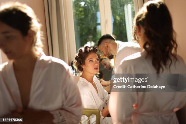 a bride getting ready before her wedding ceremony - best man stock pictures, royalty-free photos & images