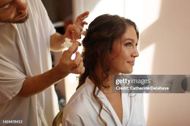 a bride getting ready before her wedding ceremony - sposa foto e immagini stock