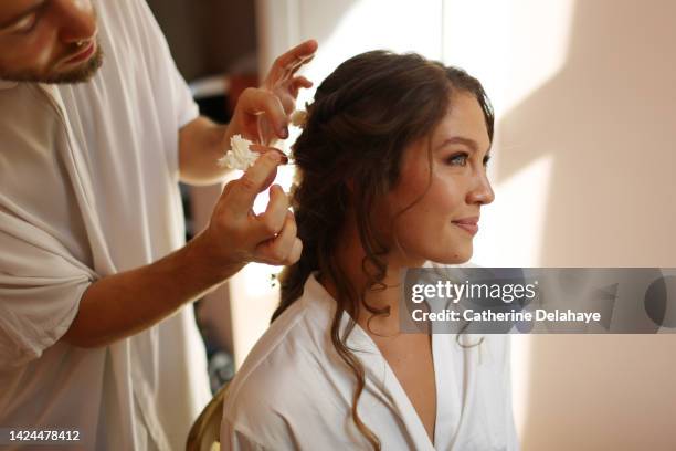 a bride getting ready before her wedding ceremony - bridal makeup stock pictures, royalty-free photos & images