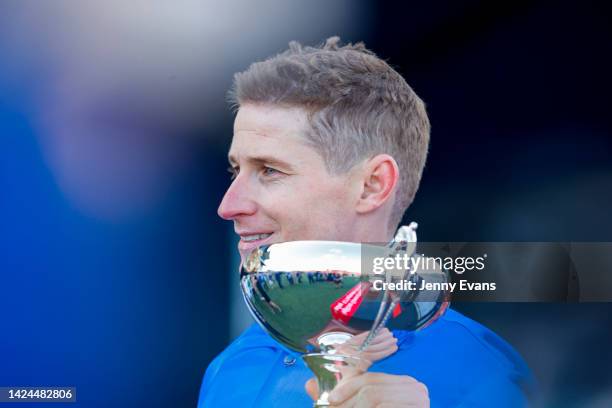 James McDonald holds his trophy after winning race 7 the Fujitsu General George Main Stakes on Anamoe during Sydney Racing at Royal Randwick...