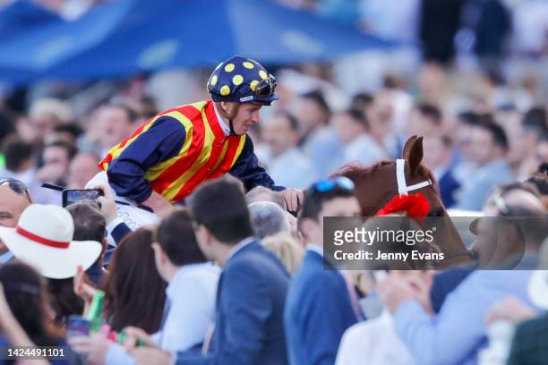 James McDonald pats Nature Strip as he returns to scale after winning race 8 the Bowermans Shorts during Sydney Racing at Royal Randwick Racecourse...