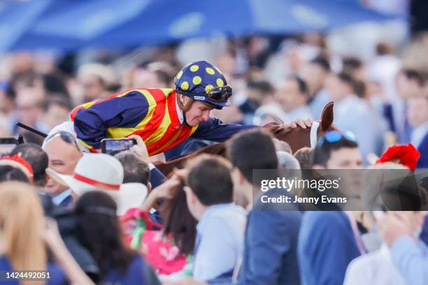 James McDonald pats Nature Strip as he returns to scale after winning race 8 the Bowermans Shorts during Sydney Racing at Royal Randwick Racecourse...