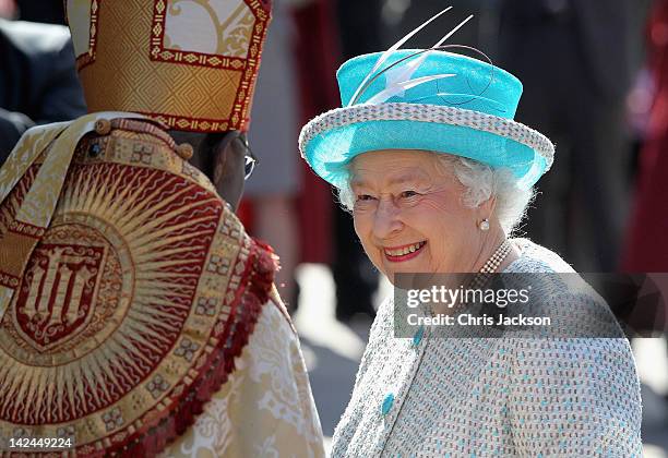 Queen Elizabeth II smiles as she greets Archbishop of York, John Sentamu as she arrives for Maundy Thursday Service at York Minster on April 5, 2012...