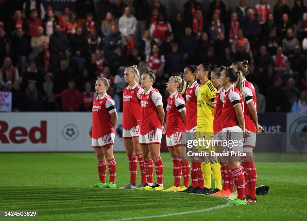 The Arsenal Women players line up for a minutes silence in honour of the passing of The Queen before the FA Women's Super League match between...