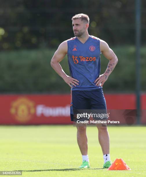 Luke Shaw of Manchester United in action during a first team training session at Carrington Training Ground on September 16, 2022 in Manchester,...