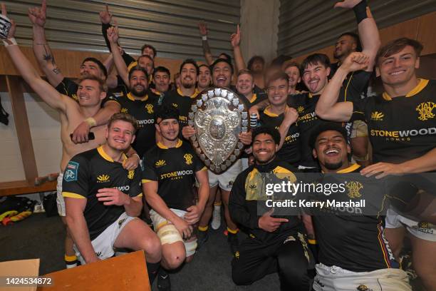 Wellington players celebrate with the Ranfurly Shield following the round seven Bunnings NPC match between Hawke's Bay and Wellington at McLean Park,...