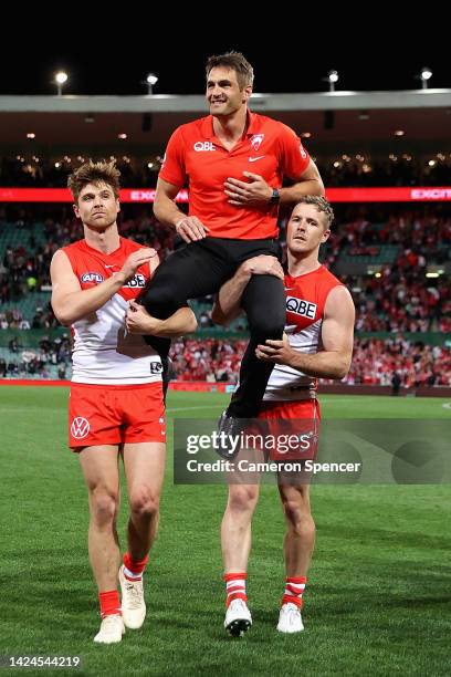 Injured retiring Swans player Josh P. Kennedy is chaired from the field during the AFL Second Preliminary match between the Sydney Swans and the...