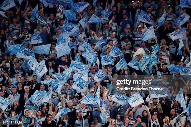 Sharks fans cheer during the NRL Semi Final match between the Cronulla Sharks and the South Sydney Rabbitohs at Allianz Stadium on September 17, 2022...