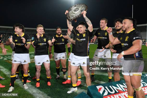 Jackson Garden-Bachop of Wellington celebrates with the Ranfurly Shield following the round seven Bunnings NPC match between Hawke's Bay and...