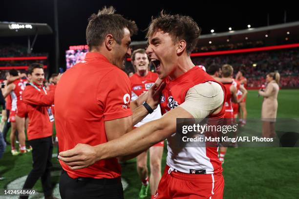 Josh P. Kennedy of the Swans embraces Ryan Clarke as they celebrate victory after the AFL Second Preliminary match between the Sydney Swans and the...