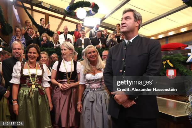 Bavarian Minister-President Markus Söder attends the opening day at Schottenhamel beer tent of the 2022 Oktoberfest beer festival at Theresienwiese...