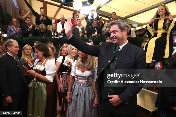 Bavarian Minister-President Markus Söder attends the opening day at Schottenhamel beer tent of the 2022 Oktoberfest beer festival at Theresienwiese...